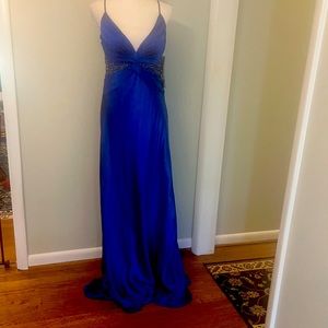 Stunning sapphire colored beaded backless gown!